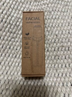 Facial Hair Remover, brand new in sealed box. Gets great reviews on Amazon.